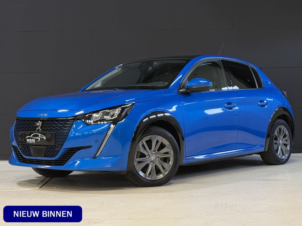 Peugeot e-208 - EV Allure 50 kWh | Panoramadak | Camera | Apple Carplay | Draadloze lader - AutoWereld.nl