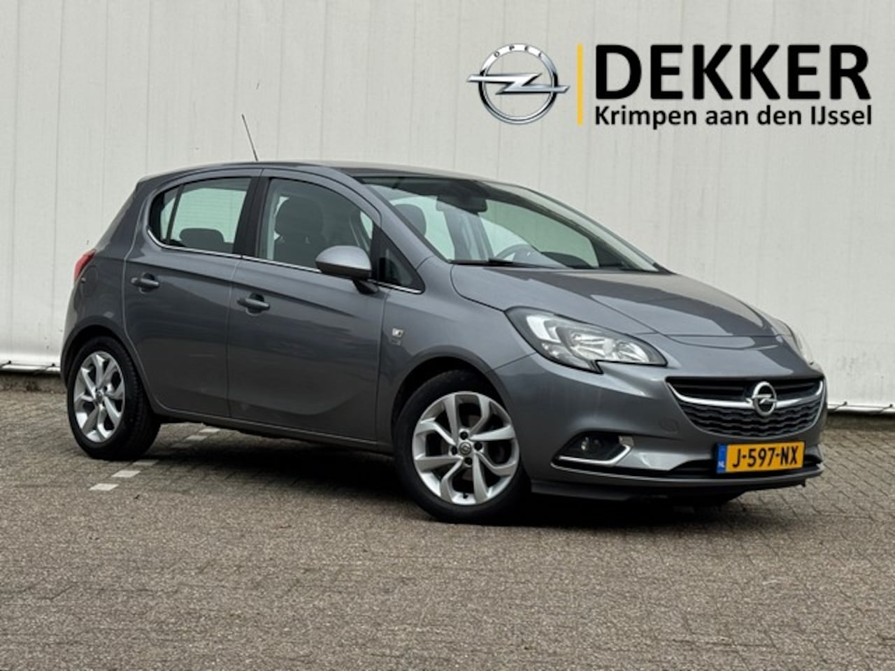 Opel Corsa - 1.4 120 Jaar Edition met CarPlay, Camera, Dealer onderhouden! - AutoWereld.nl