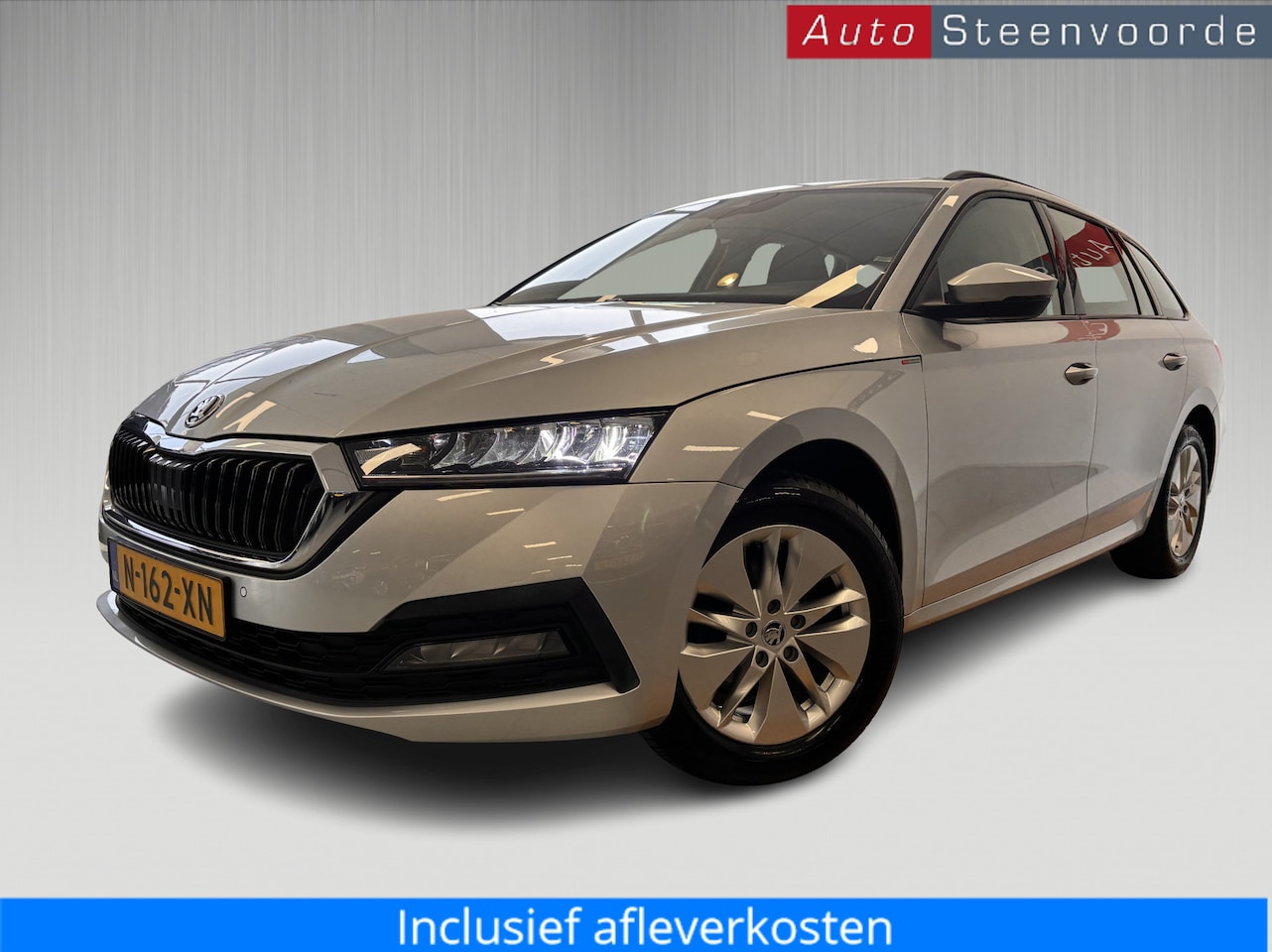 Skoda Octavia Combi - 1.0 e-TSI Business Edition - cam - navi - carplay - trekhaak - AutoWereld.nl