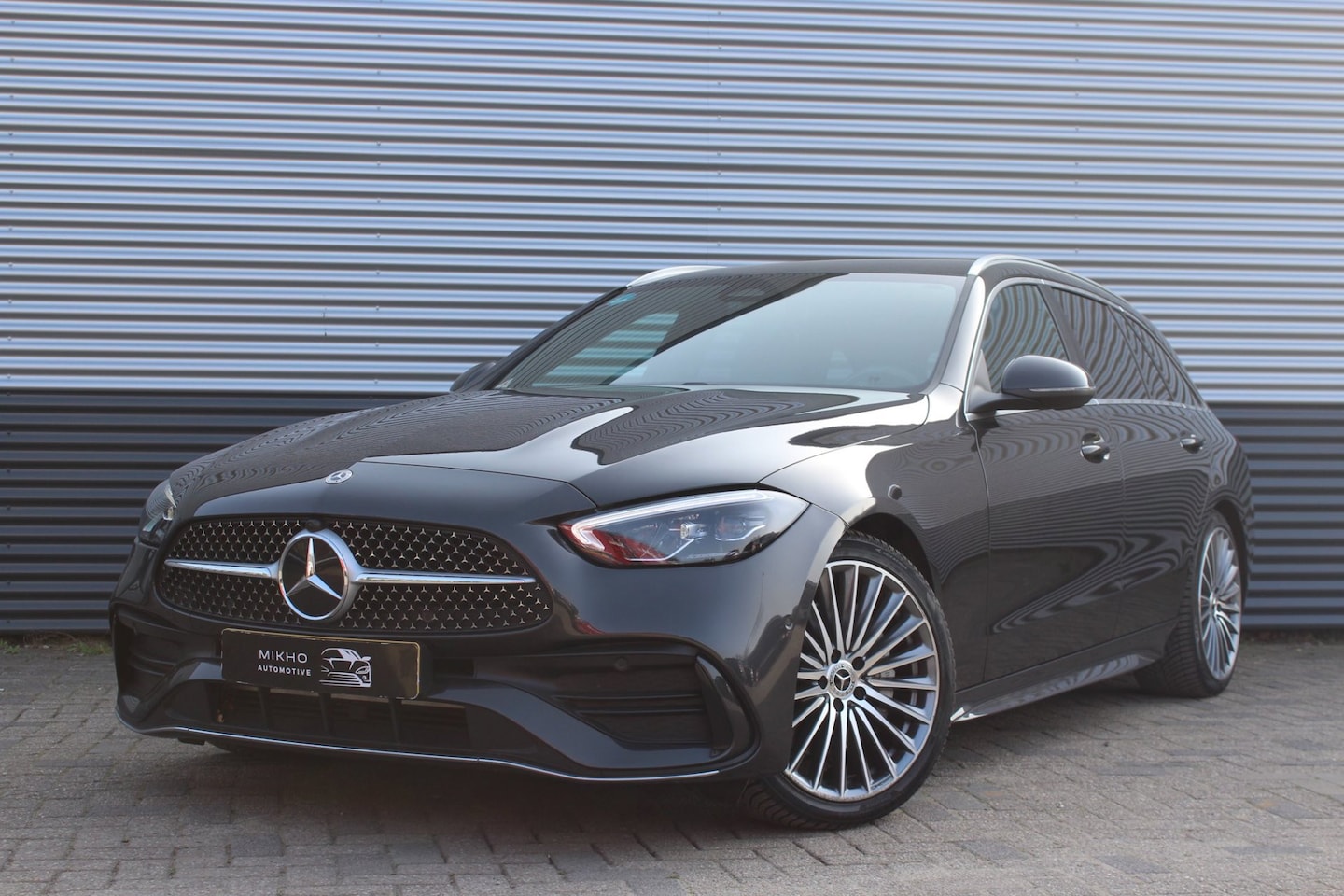 Mercedes-Benz C-klasse Estate - 180 AMG Line | Camera | Trekhaak | Stoelverwarming | Sfeerverlichting | Apple carplay | - AutoWereld.nl