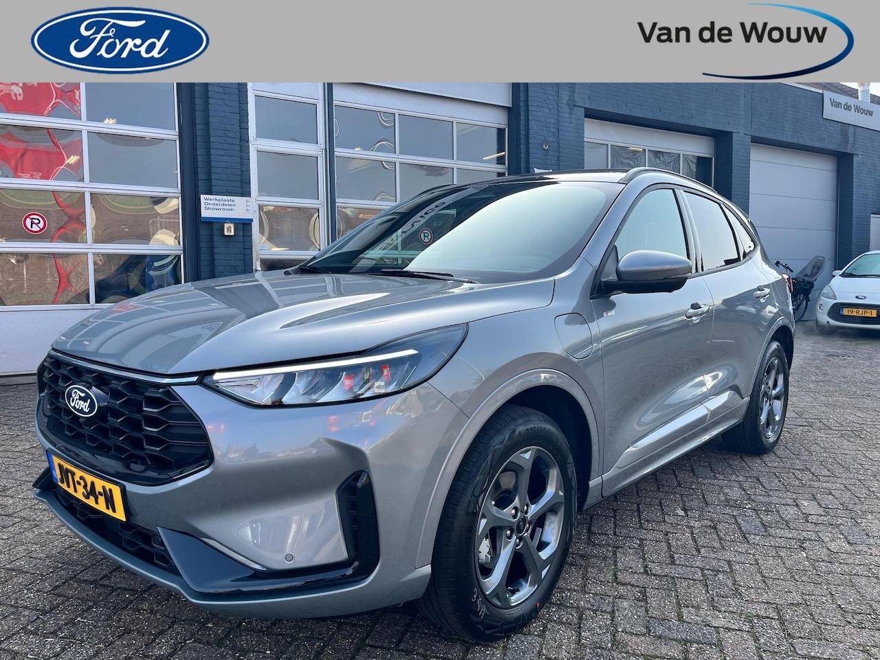 Ford Kuga - 2.5 PHEV ST-Line l Panoramadak l Wegklapbare trekhaak l Winterpack l Driver Assistance Pac - AutoWereld.nl