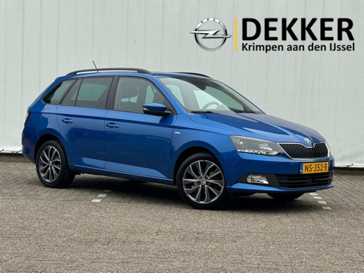 Skoda Fabia Combi - 1.2 TSI Drive met Navigatie, Trekhaak, Climate Controle - AutoWereld.nl