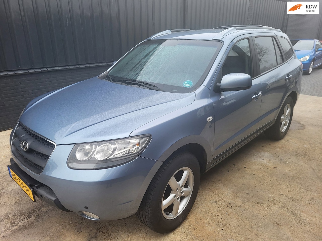 Hyundai Santa Fe - 2.7i V6 Dynamic 7p. 2.7i V6 Dynamic 7p.5-bak - AutoWereld.nl