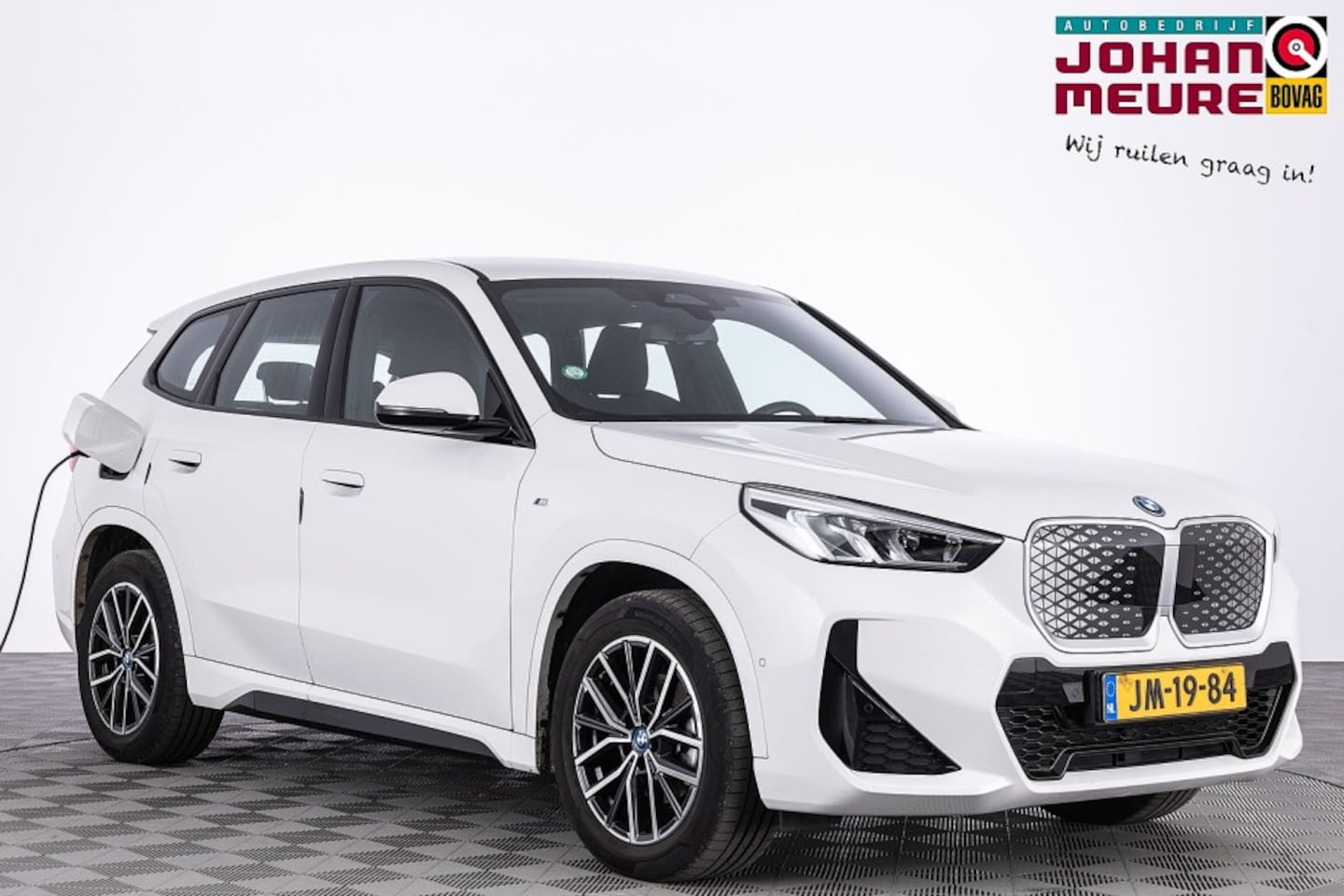 BMW iX1 - eDrive20 67 kWh M-Sport *SOH 99%* Full LED | NAVI | CAMERA | Half LEDER - AutoWereld.nl