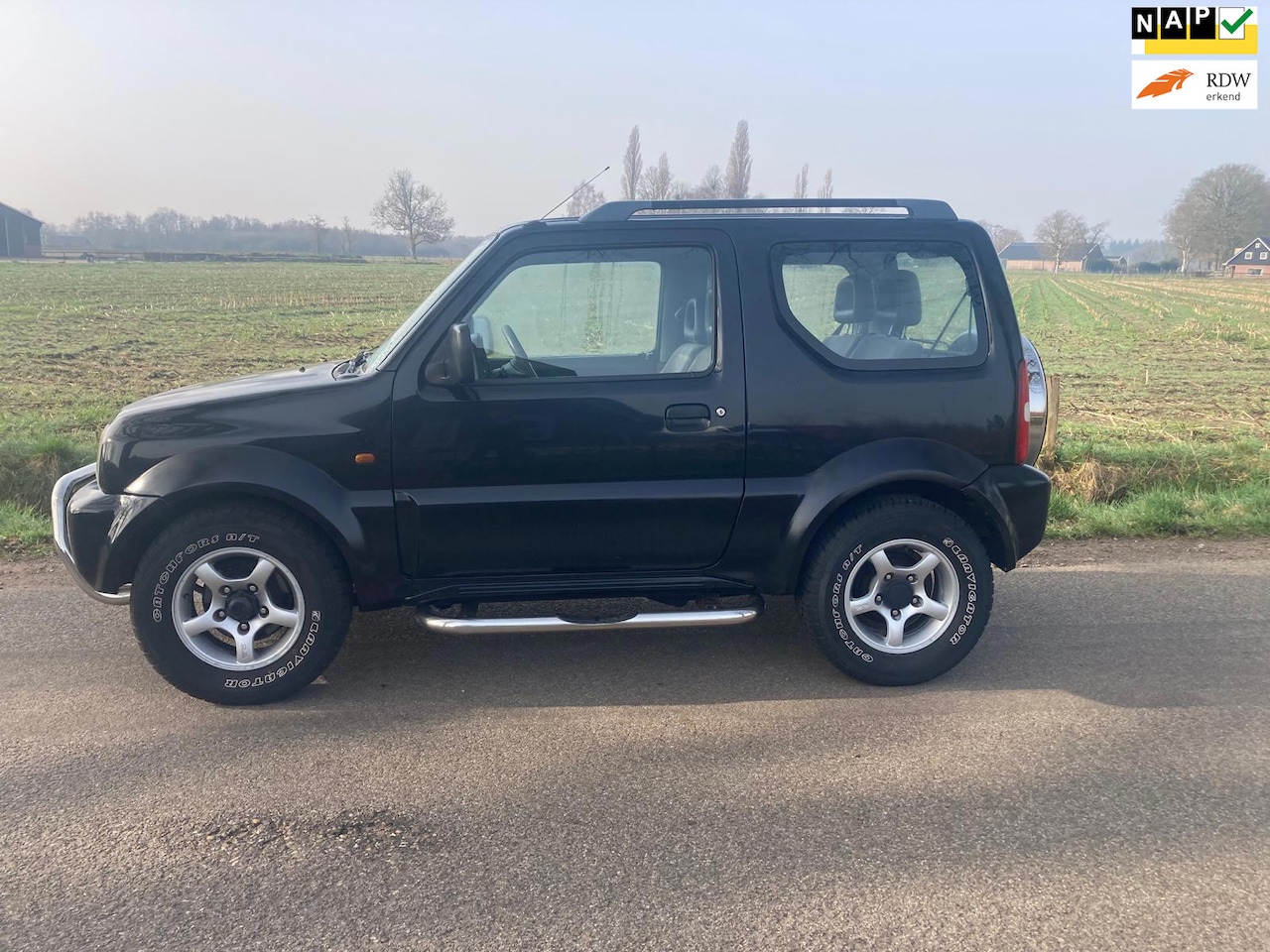 Suzuki Jimny - 1.3 JLX 4WD Airco NAP Zwart apk sept/26 - AutoWereld.nl