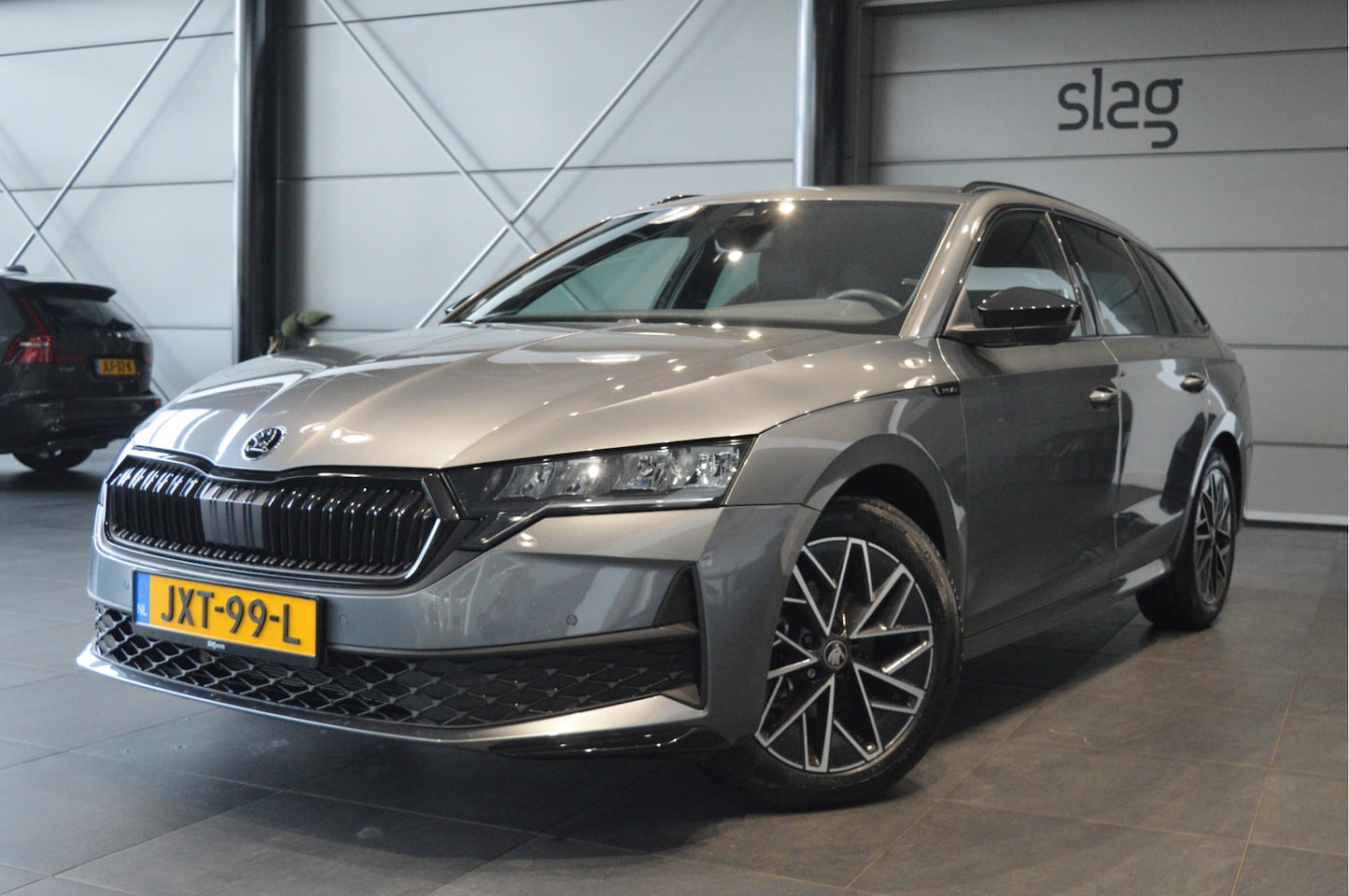 Skoda Octavia Combi - 2.0 TDI Sportline navi camera led trekhaak 150 pk !! - AutoWereld.nl