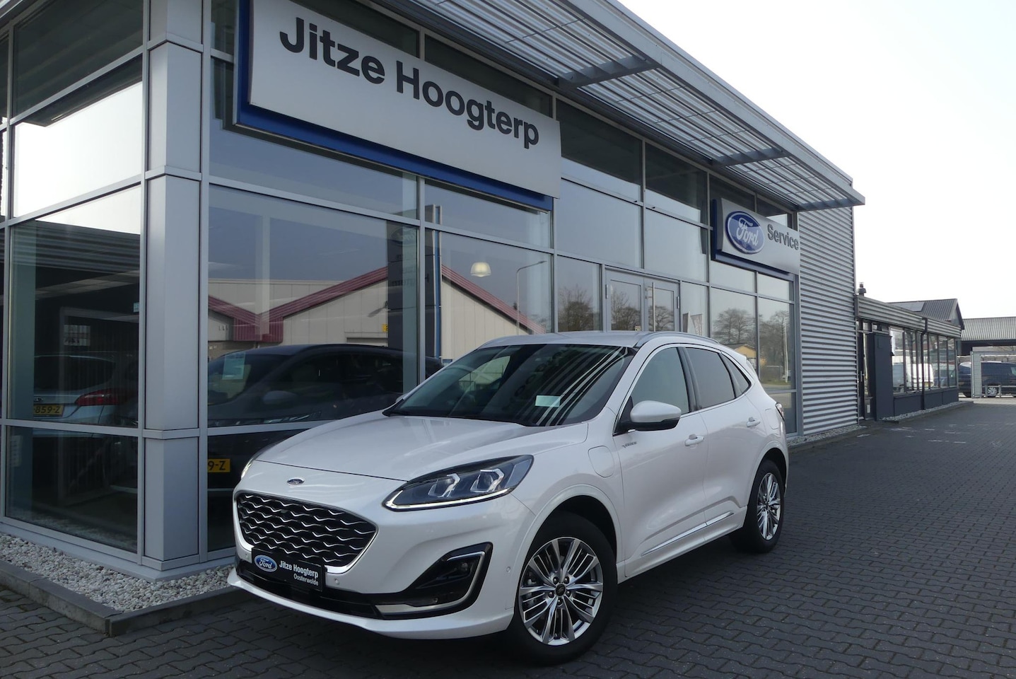 Ford Kuga - 2.5 PHEV Vignale ELEKT. TREKHAAK (1.500KG), HUD, MEMORY, WINTER PACK, ADAPT. CRUISE, CLIMA - AutoWereld.nl