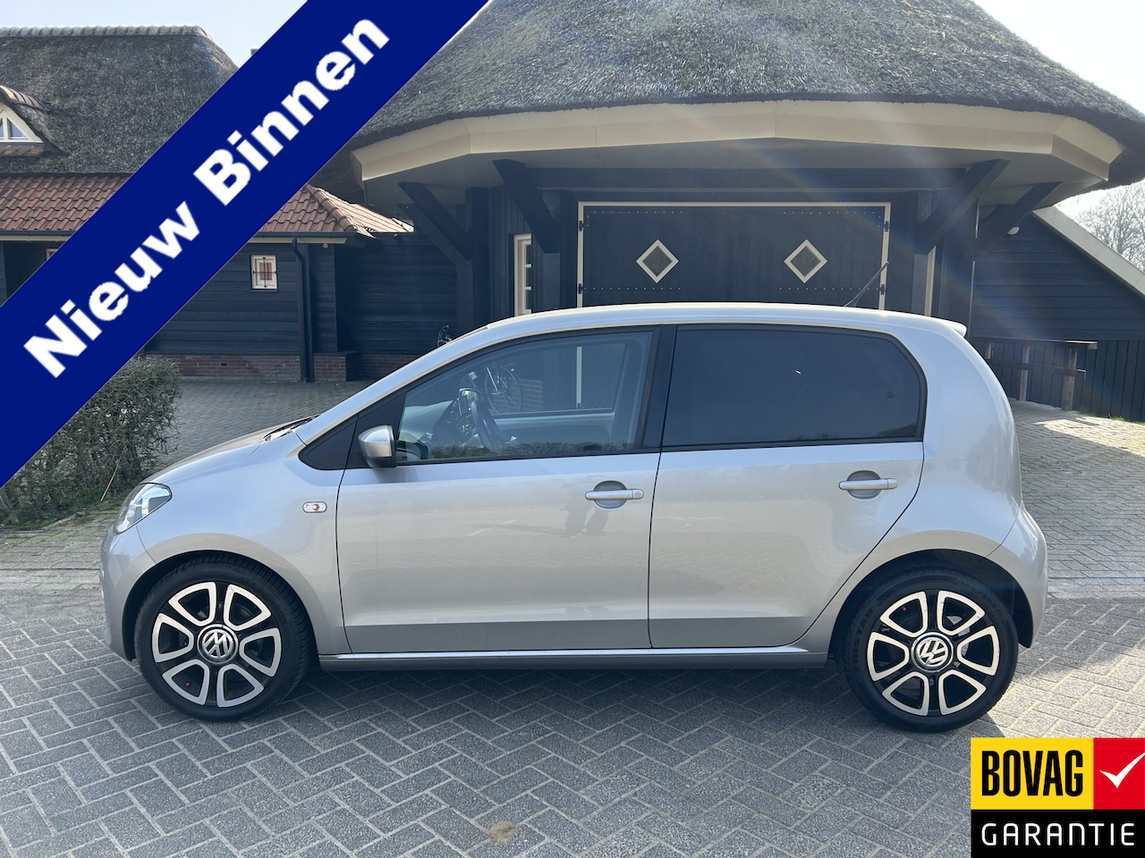 Volkswagen Up! - 1.0 high up! BlueMotion Cruise Pdc Navigatie Leder pakket Airco - AutoWereld.nl