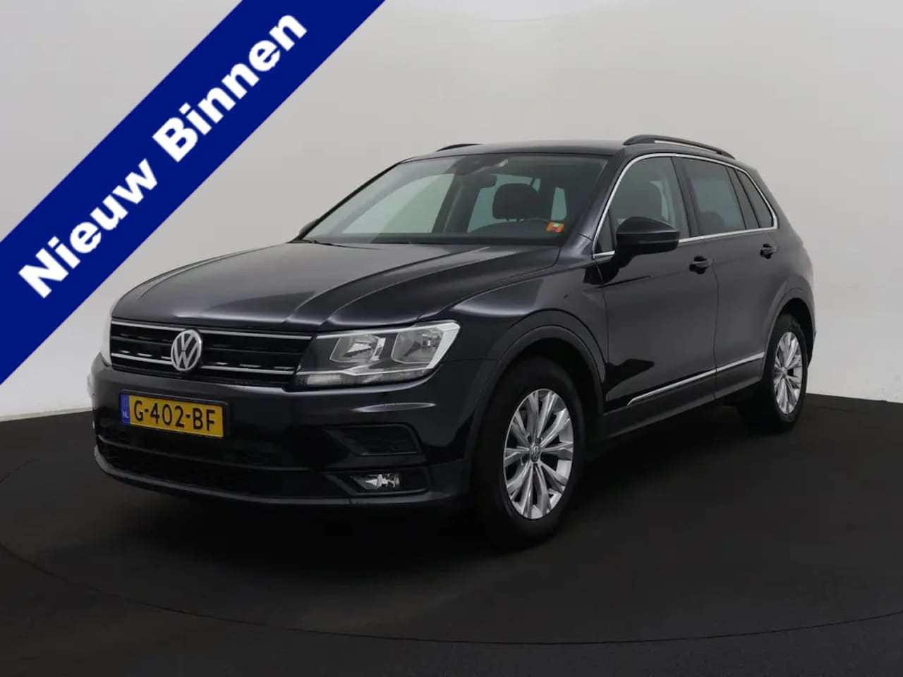 Volkswagen Tiguan - 1.5 TSI ACT Comfortline Trekhaak,Navi,18Inch,Clima 1e eigen 150pk hoge zit - AutoWereld.nl