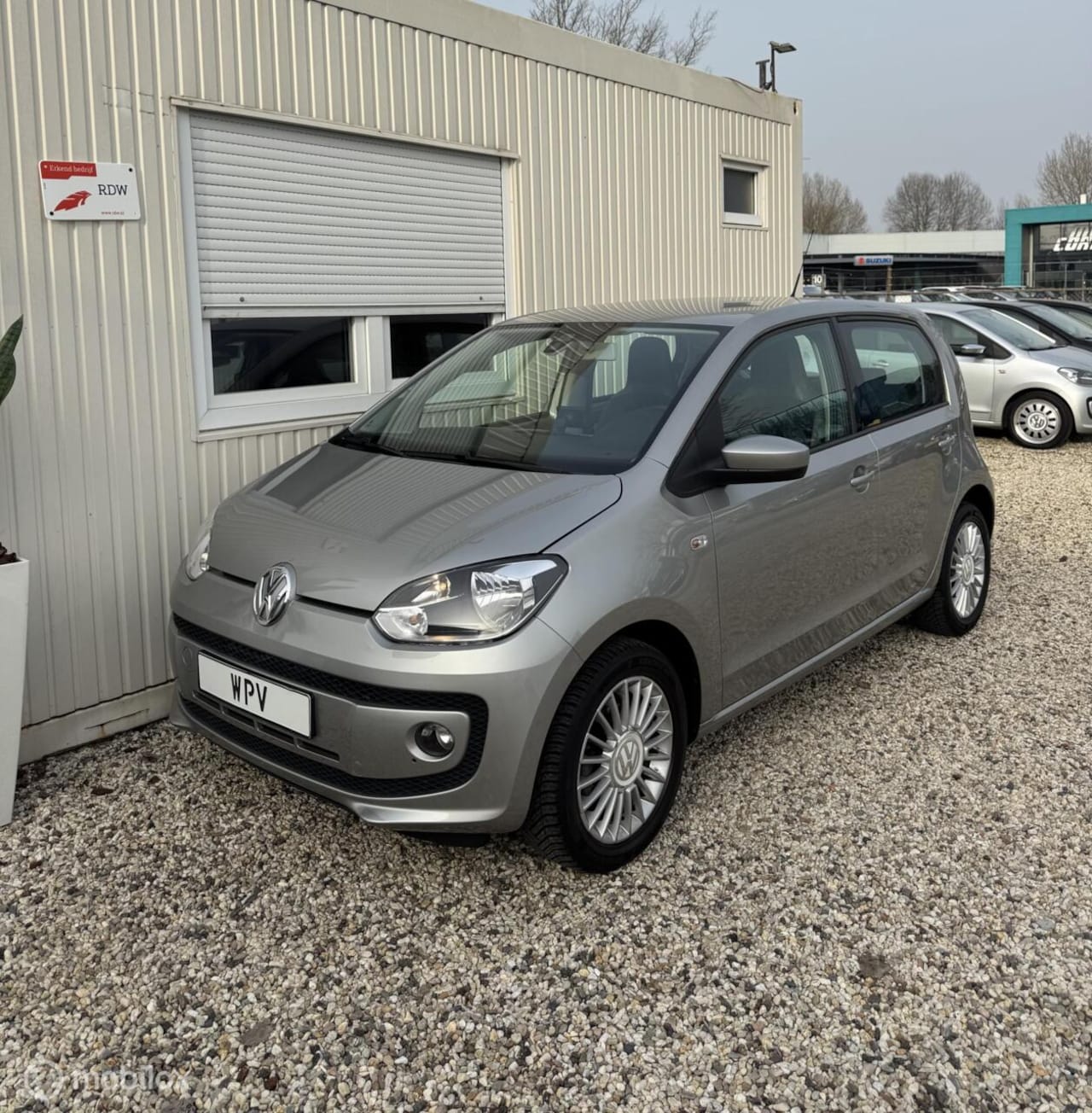 Volkswagen Up! - 1.0 High up! Navigatie Stoelverwarming Airco - AutoWereld.nl