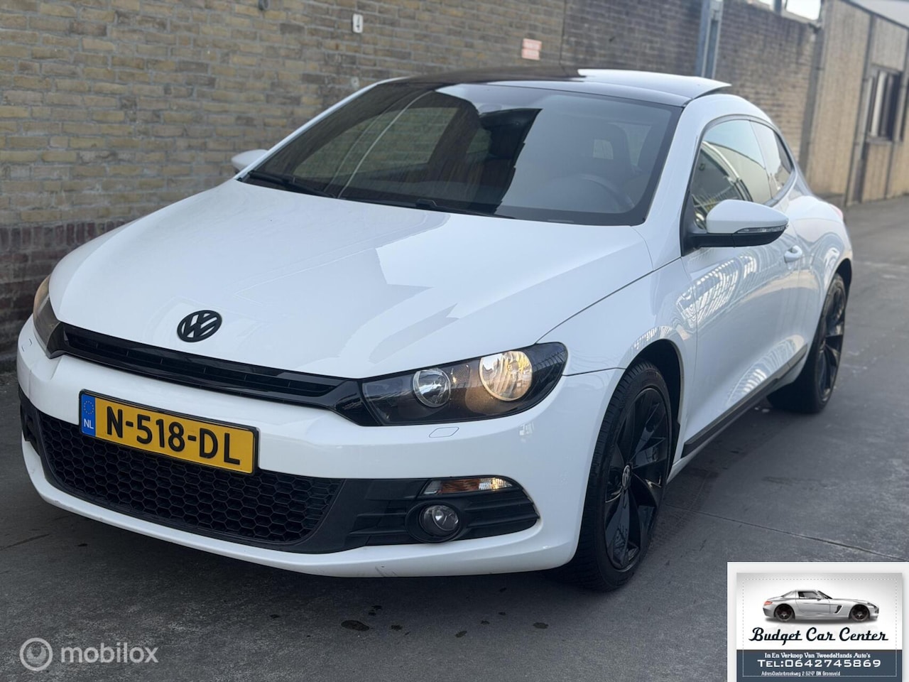 Volkswagen Scirocco - 1.4 TSI kateldak. - AutoWereld.nl