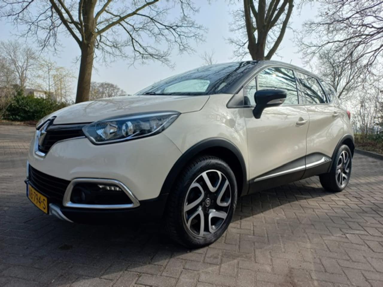 Renault Captur - 1.2 TCe Xmod vele optie,s airco cruis leder navi - AutoWereld.nl
