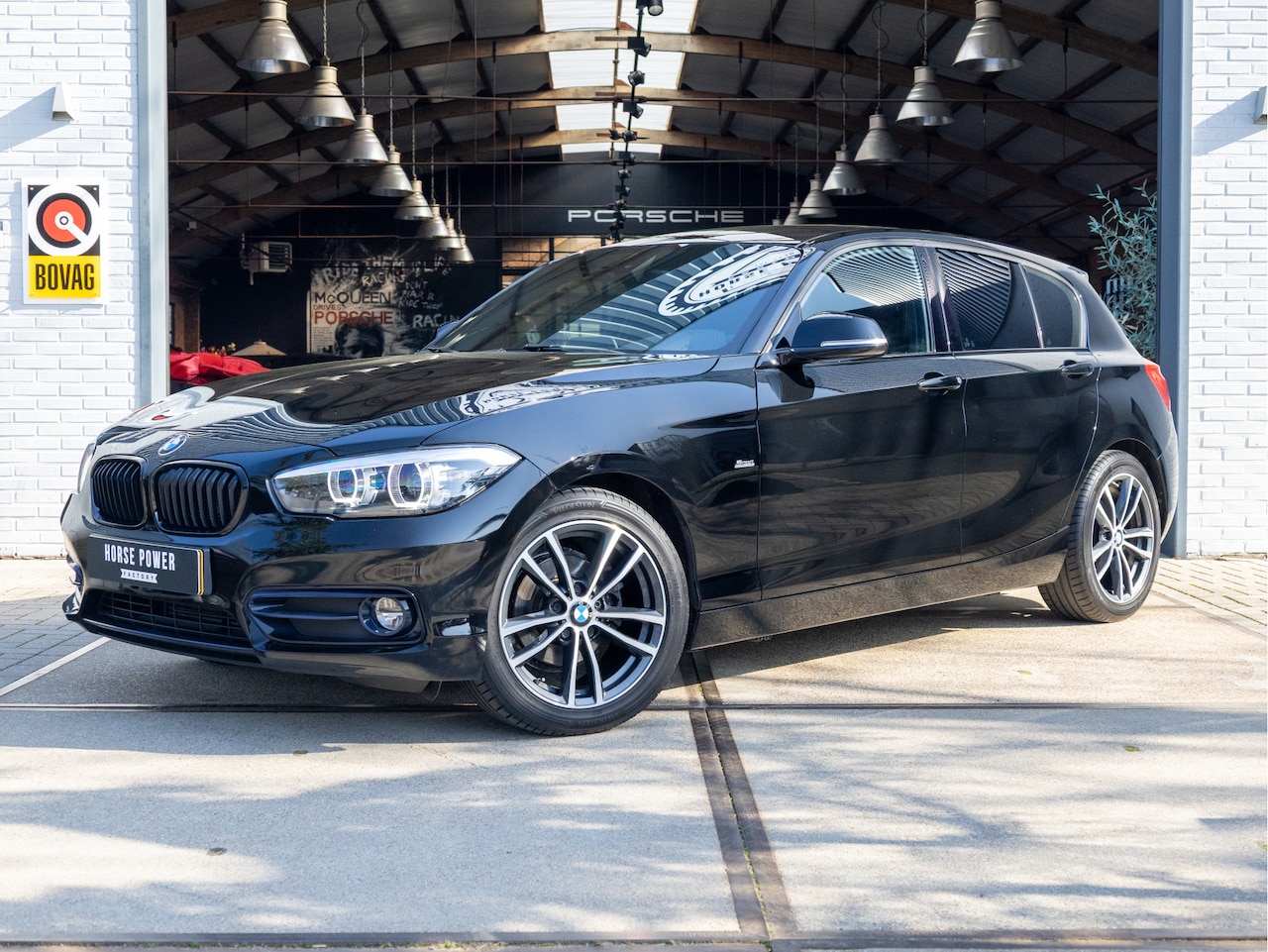 BMW 1-serie - 116i Edition Sport Line Shadow Executive M *Navi | Cruise | Clima | LED | Keyless | 17" | - AutoWereld.nl