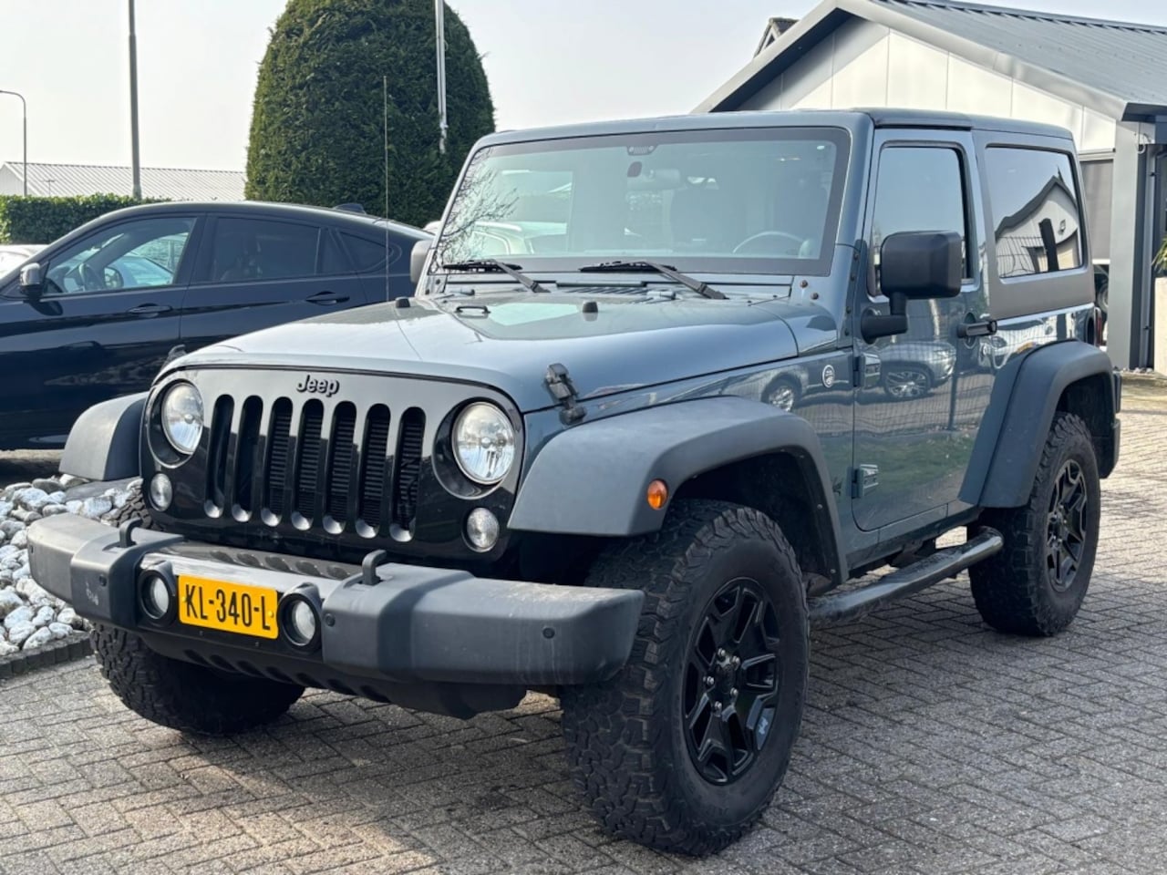 Jeep Wrangler - 3.6 Sahara Benzine Automaat Cabrio 4-Persoons 2014 - AutoWereld.nl