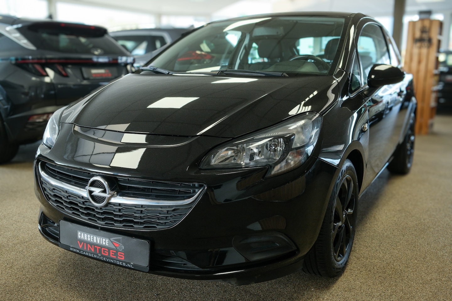 Opel Corsa - 1.4 Cosmo Airco, Navi, Cruise, L/m velgen! - AutoWereld.nl