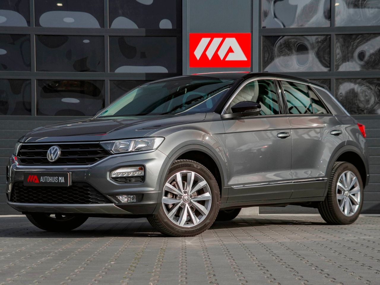 Volkswagen T-Roc - 1.0 TSI Style Business PDC|Trekhaak|Carplay|DAB|Cruise - AutoWereld.nl