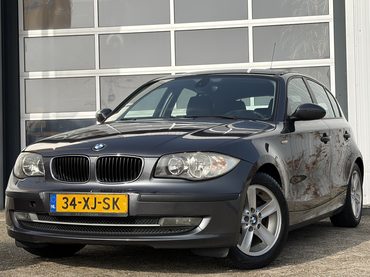BMW 1-serie - 116i Business Line 116pk | Airco | Cruise control | Isofix bevestiging voor kinderzitjes | - AutoWereld.nl