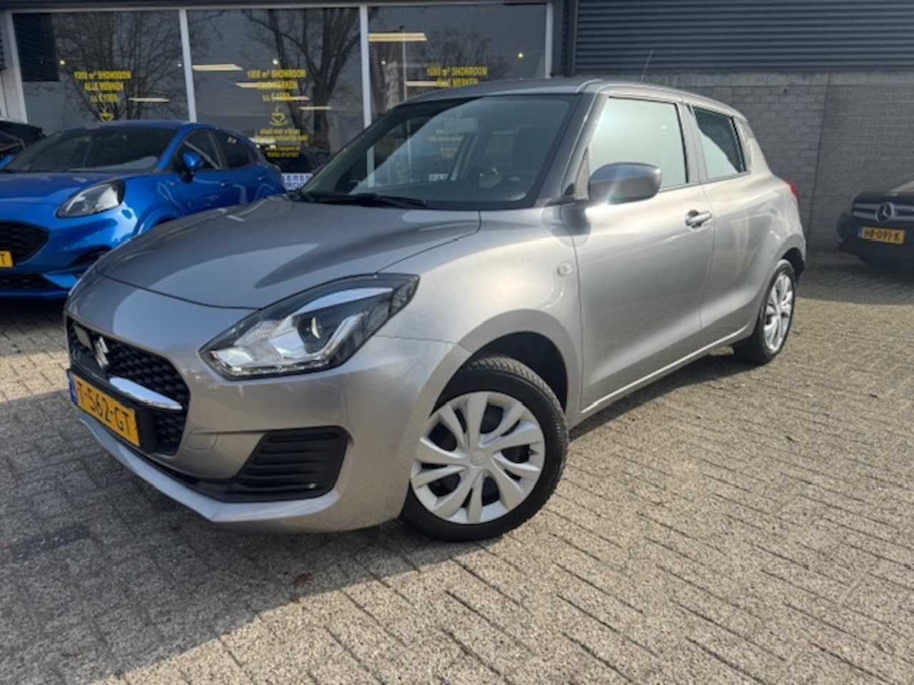 Suzuki Swift - 1.2 Comfort Smart Hybrid Adaptive/Led/DAB - AutoWereld.nl