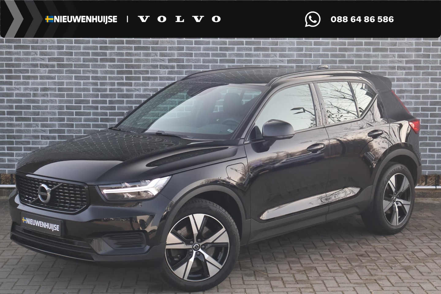 Volvo XC40 - Plug-in Hybrid T4 R-Design | Lederen bekleding | Navigatie | Elektrische stoelverstelling - AutoWereld.nl