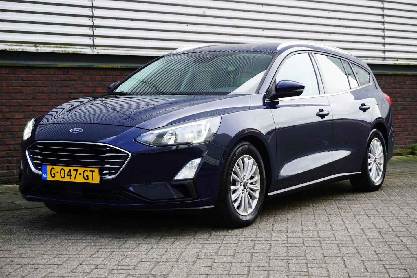 Ford Focus Wagon - 1.0 EcoB.125PK Titanium Bus./Comfortstoelen/ B&O Geluidsinstallatie. - AutoWereld.nl