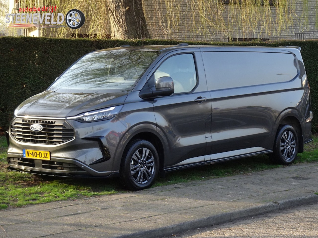Ford Transit Custom - 2.0 TDCI 130pk L2H1 Limited met Camera, Trekhaak en Spoiler Pakk - AutoWereld.nl