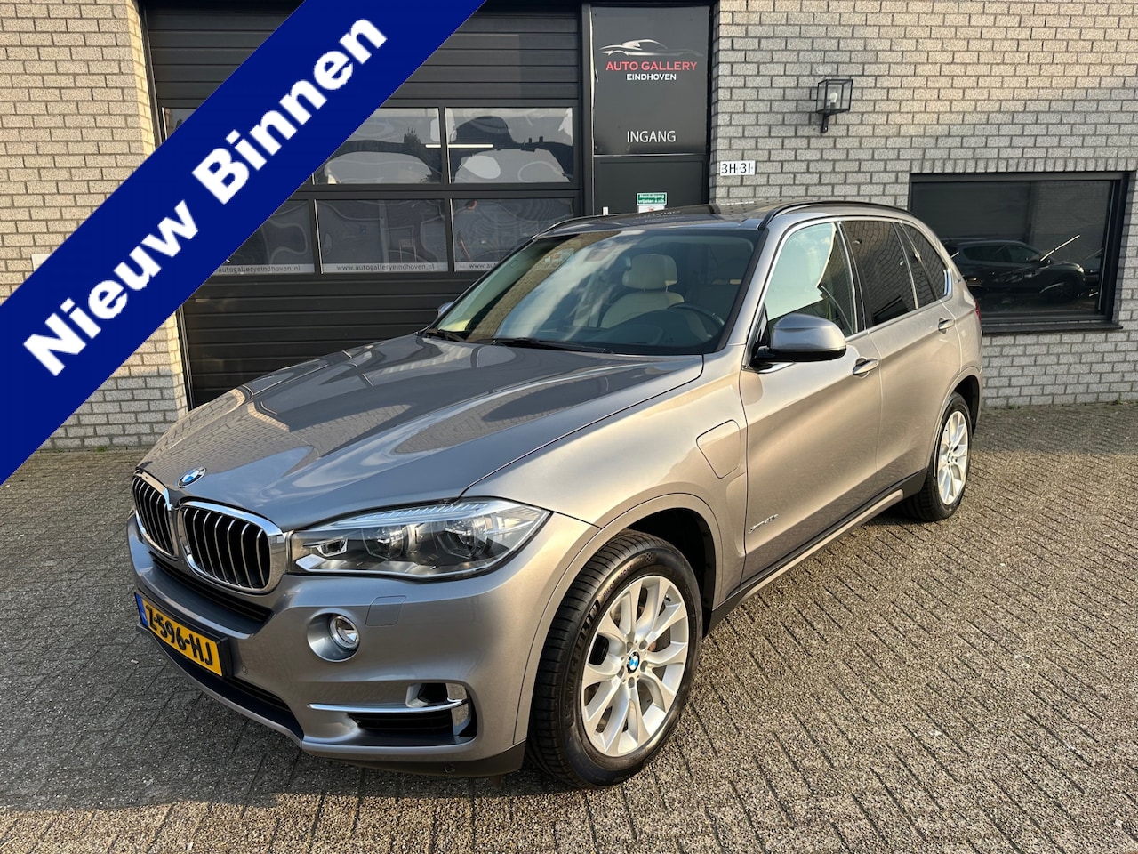 BMW X5 - xDrive40e iPerformance High Executive *PANO-DAK*TREKHAAK*HEAD-UP*LEDER*NAVI* - AutoWereld.nl