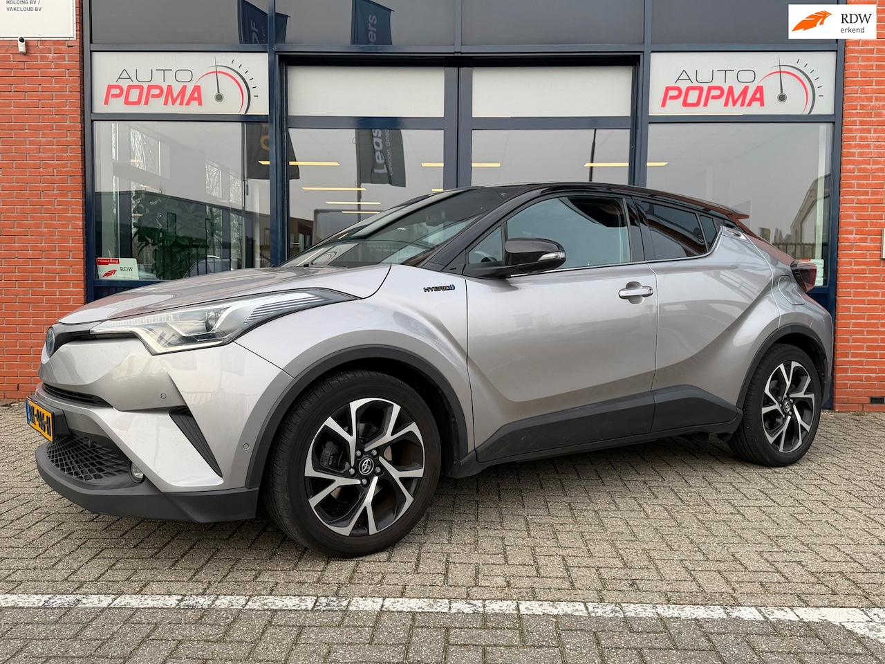 Toyota C-HR - 1.8 Hybrid Bi-Tone Plus Carplay/trekhaak - AutoWereld.nl