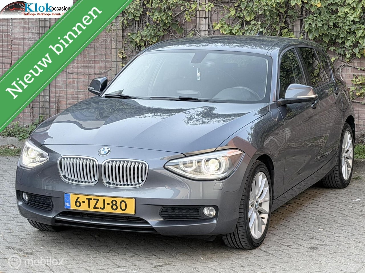 BMW 1-serie - 116i EDE Business+ Clima Cruise Stoel verwarming - AutoWereld.nl