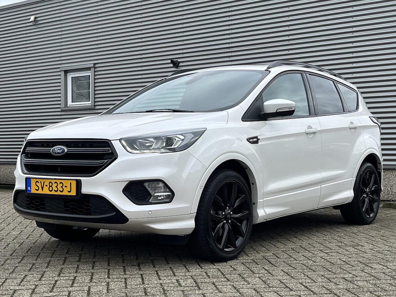 Ford Kuga - 1.5 EcoBoost 150PK 2WD ST Line 'Platinum White' | 19 inch | Panorama dak | Gave auto! - AutoWereld.nl