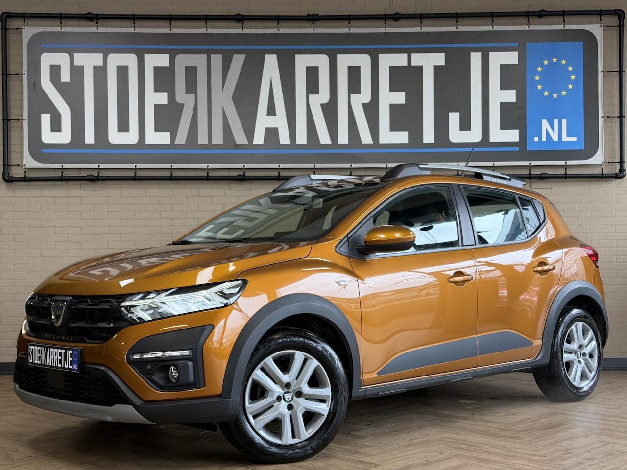 Dacia Sandero Stepway - 1.0 TCe 90 AUT Comfort | Navi | Camera | Clima | Carplay | Cruise control | PDC | LED | 10 - AutoWereld.nl