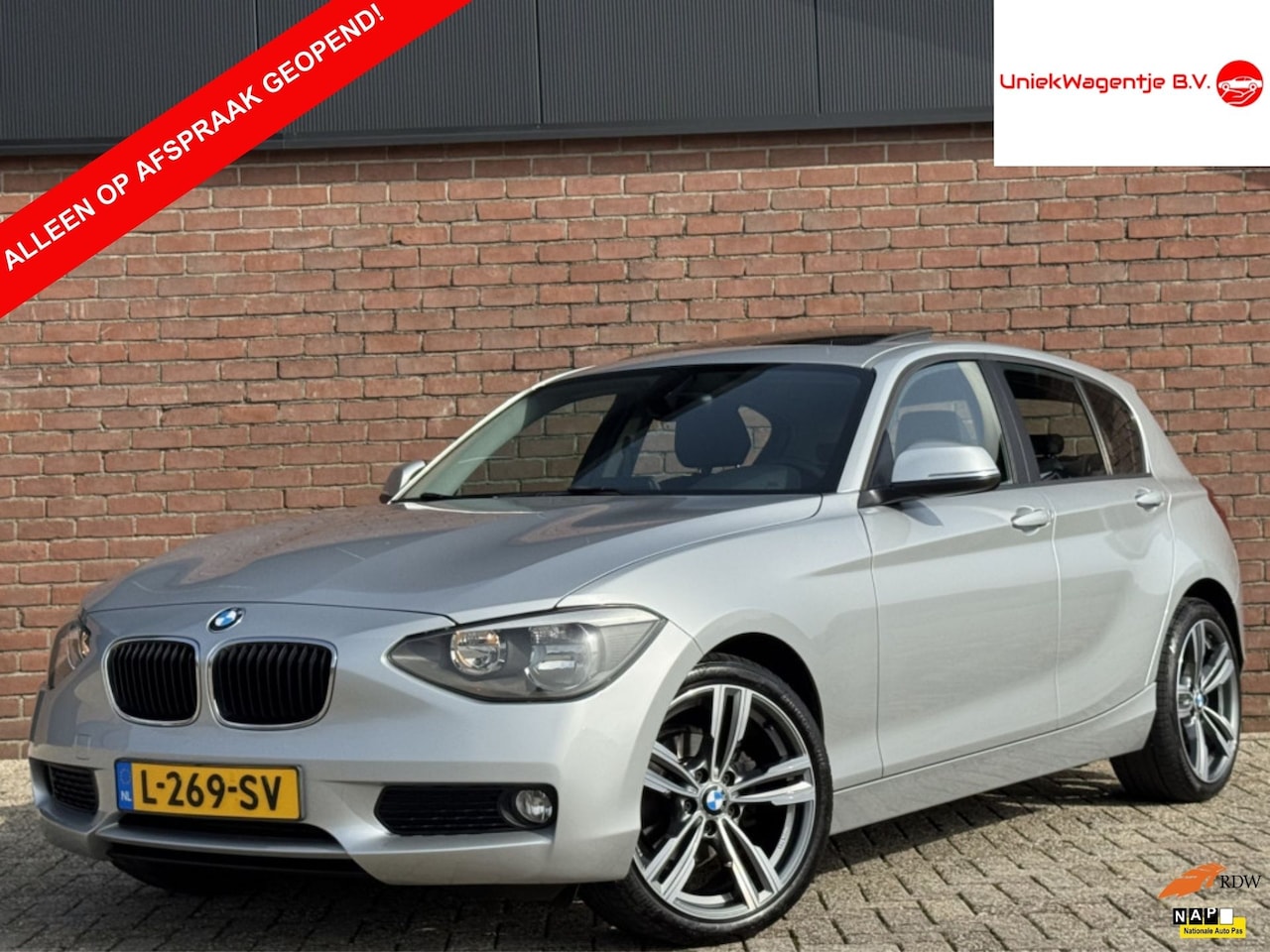 BMW 1-serie - 116I EXECUTIVE | PANODAK! | CRUISE! | CLIMA! - AutoWereld.nl