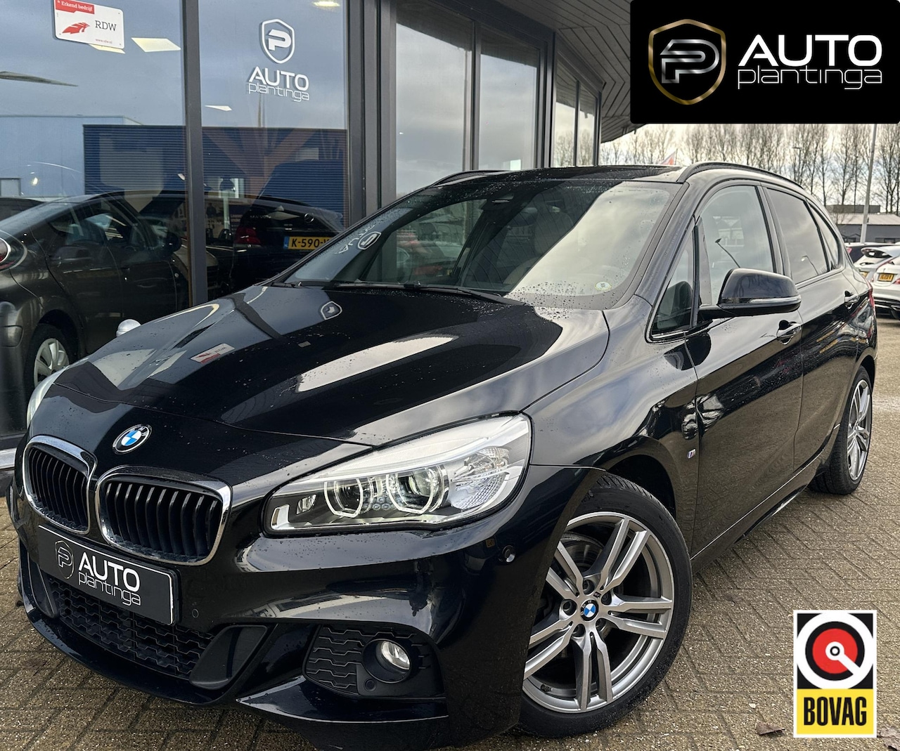 BMW 2-serie Active Tourer - 218i Centennial High Executive | AUTOMAAT | M Pakket | Head UP | PANO | Achteruitijcamera - AutoWereld.nl
