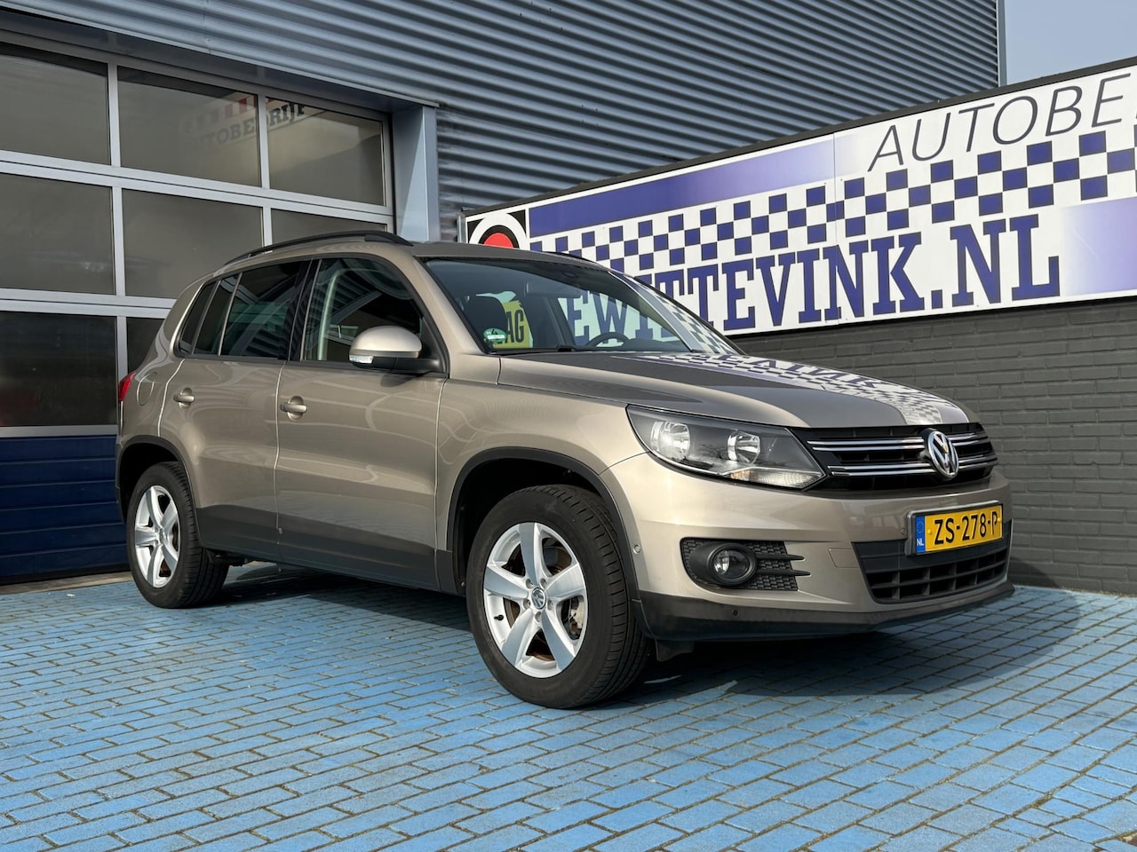 Volkswagen Tiguan - 1.4 TSI CRUISE PDC V+A TREKHAAK - AutoWereld.nl