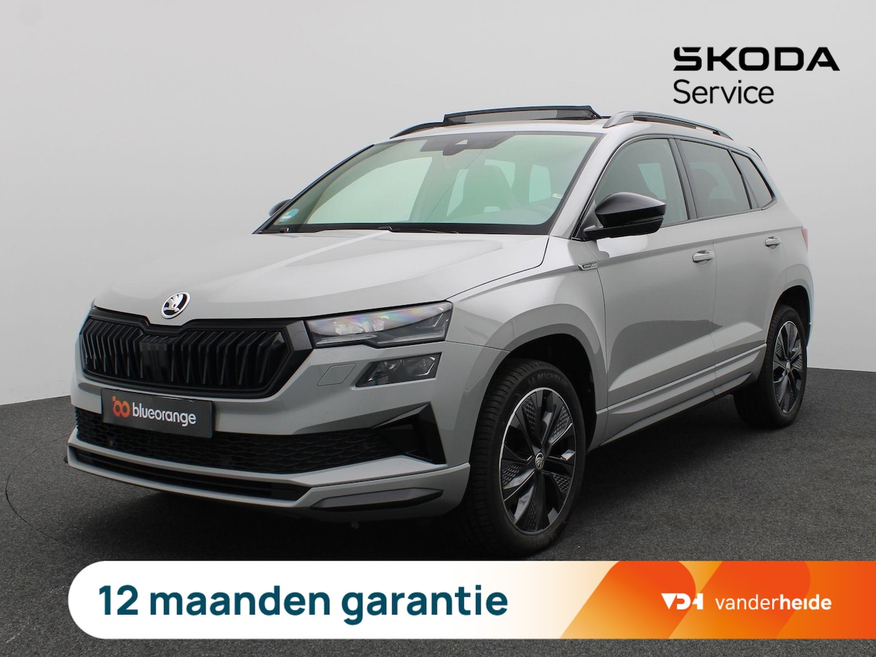 Skoda Karoq - 1.5 TSI ACT Sportline Business 150PK Facelift, Pano-Schuifdak, Trekhaak, 18" LM Velgen, Ad - AutoWereld.nl