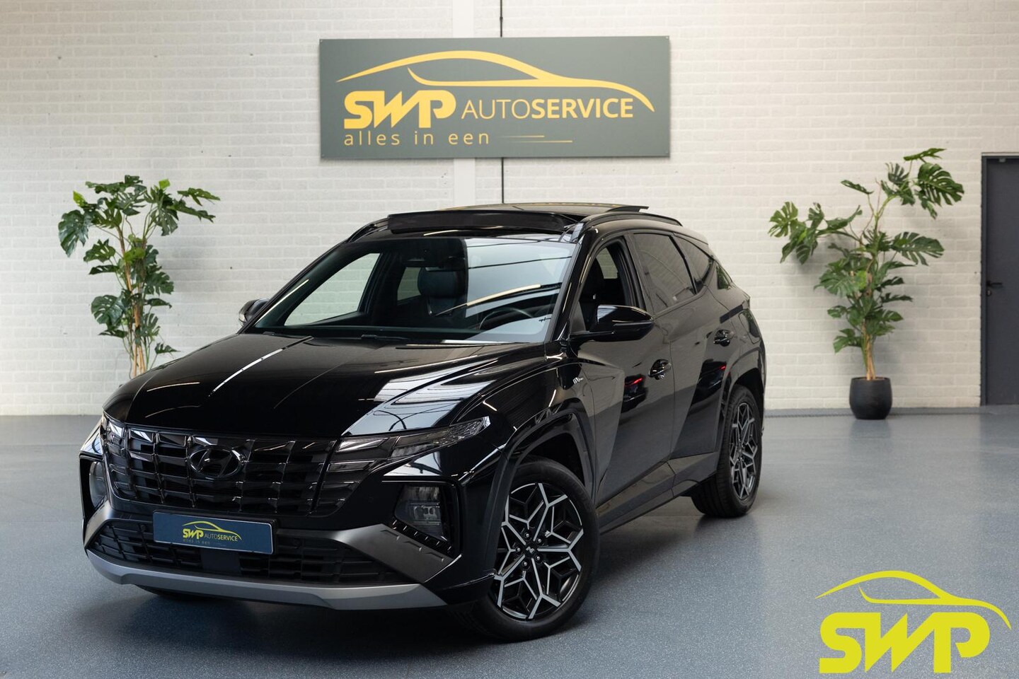 Hyundai Tucson - 1.6 T-GDI PHEV N Line Sky 4WD Edition | Pano | Camera | Navi | Plug-in - AutoWereld.nl