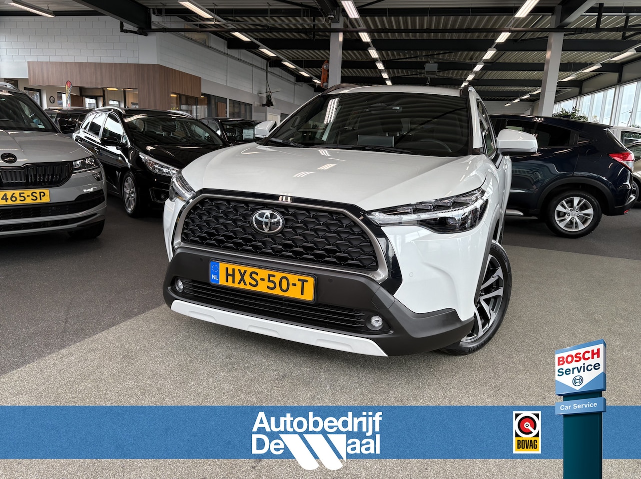 Toyota Corolla Cross - 1.8 Hybrid 140 Style Plus KEYLESS/CAMERA/NAVI/DODEHOEK/WINTERPACK - AutoWereld.nl