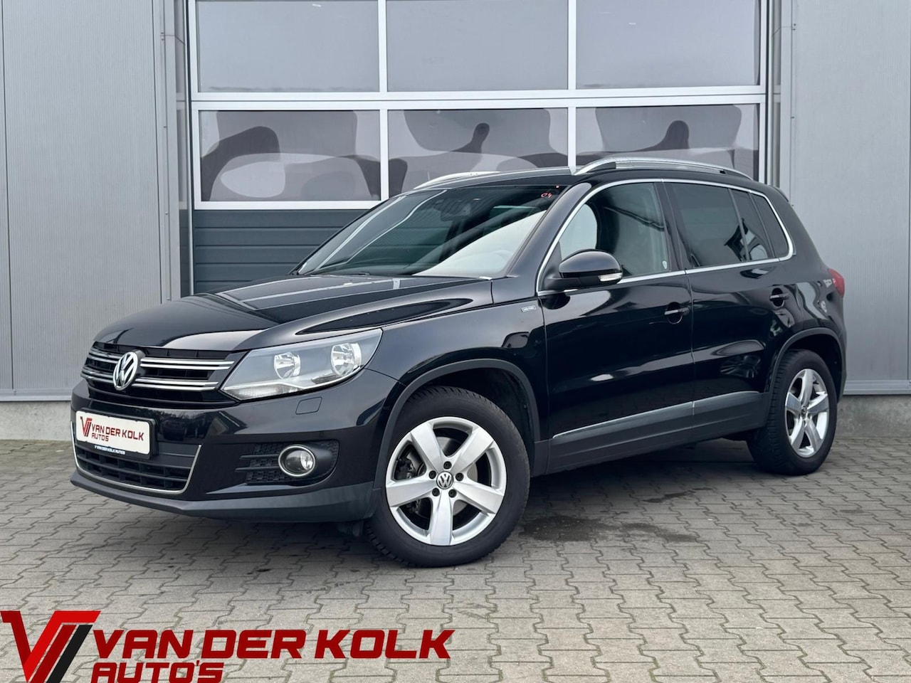 Volkswagen Tiguan - 1.4 TSI Lounge | Camera | Navigatie | Cruise | Climate | Stoelverwarming - AutoWereld.nl
