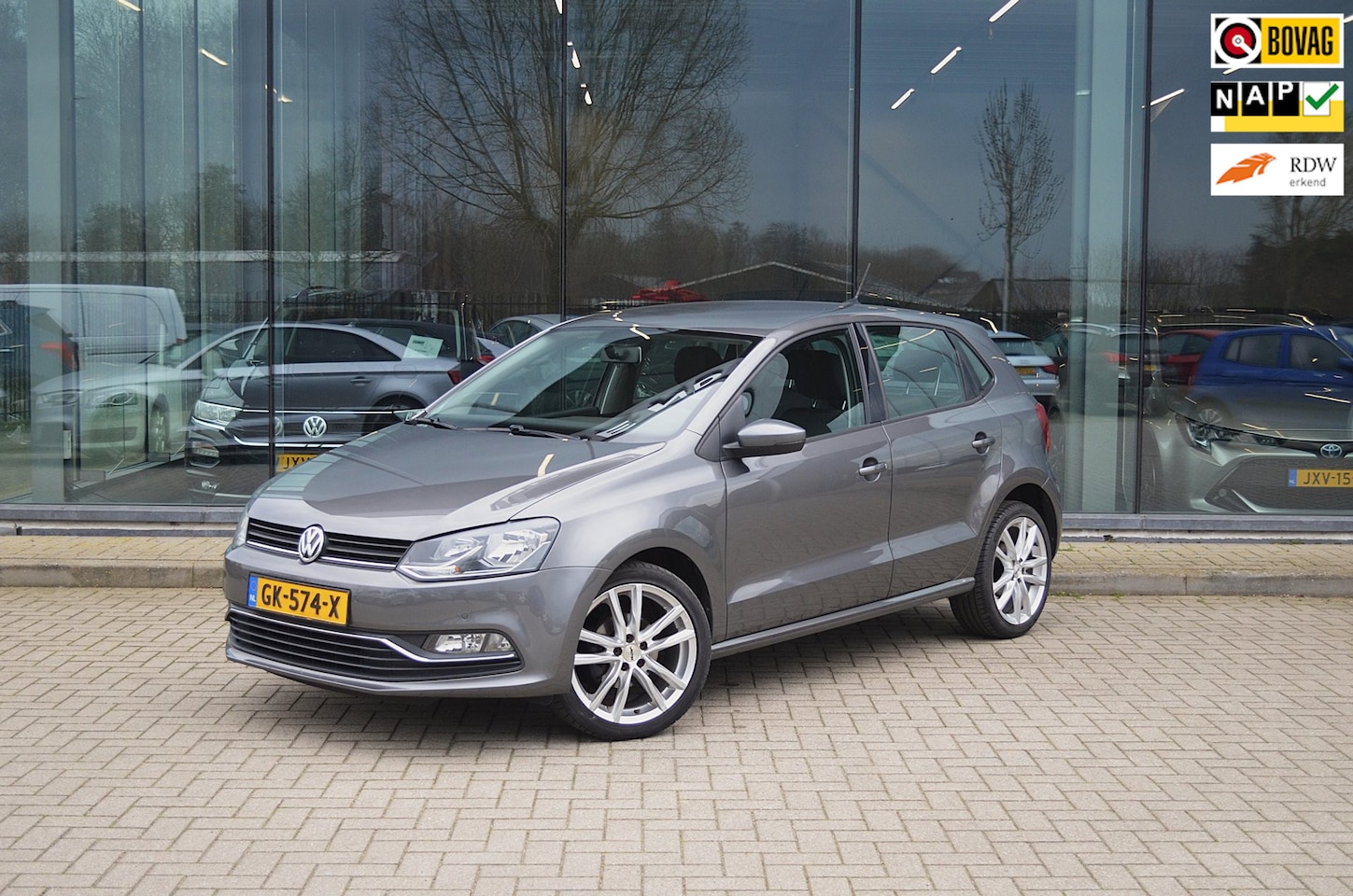 Volkswagen Polo - 1.2 TSI Comfortline | Cruise controle | Pdc | Bluetooth | Navi - AutoWereld.nl