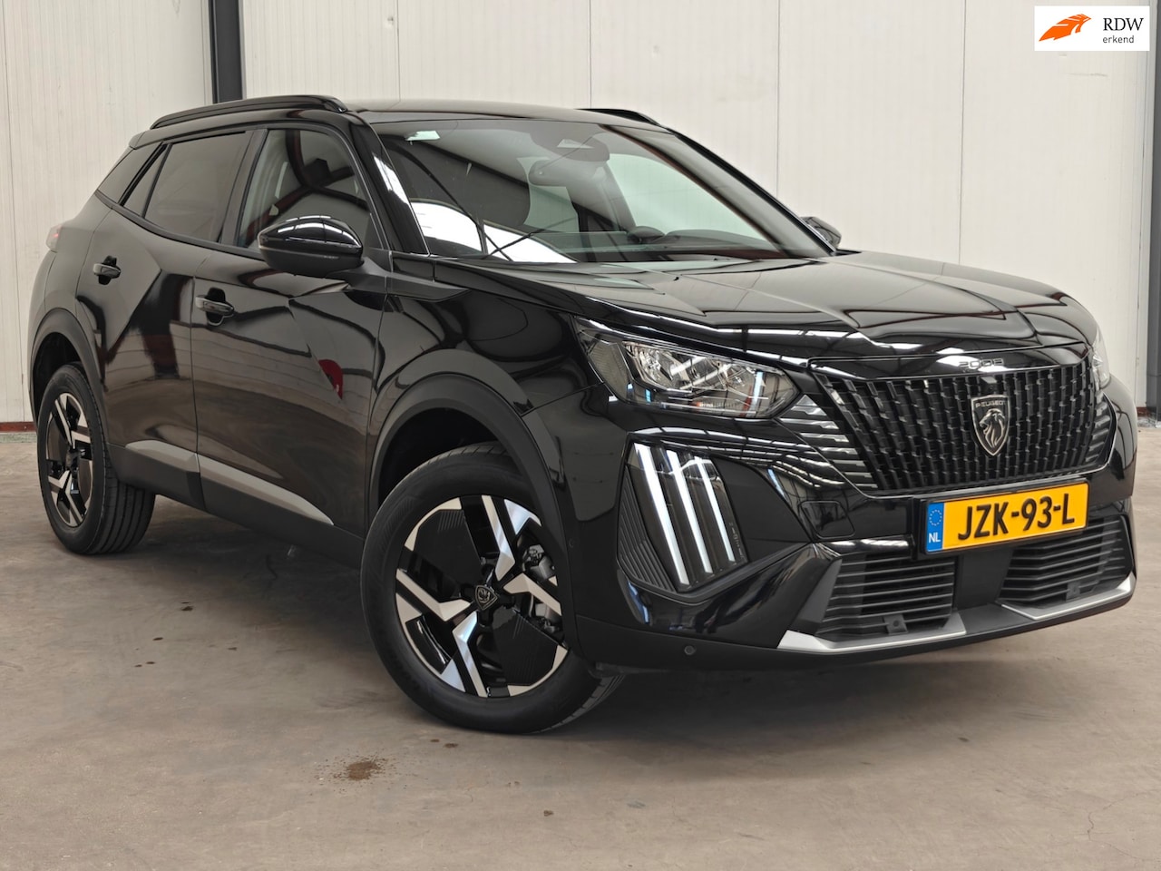 Peugeot 2008 - 1.2 Hybrid 145 Allure Adaptive|Keyless|360° Cam|Navi|Carplay - AutoWereld.nl