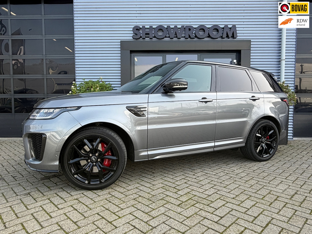Land Rover Range Rover Sport - P575 SVR Carbon Edition Suede hemel|Apple Carplay|Stoelverwarming en koeling|Pano|Head up - AutoWereld.nl