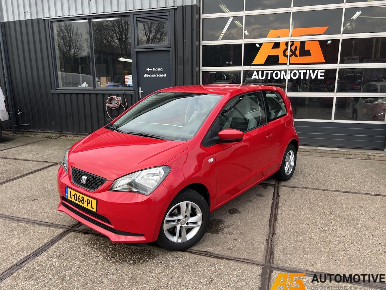 SEAT Mii - 1.0 2013 Rood | Airco | Cruise | PDC | - AutoWereld.nl