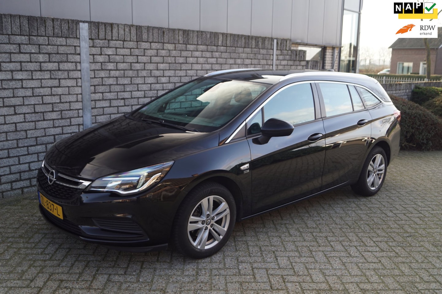 Opel Astra Sports Tourer - 1.4 Turbo 120 Jaar Edition 150PK Airco Navi Apple Carplay Cruise PDC LMV Trekhaak ENZ NL A - AutoWereld.nl