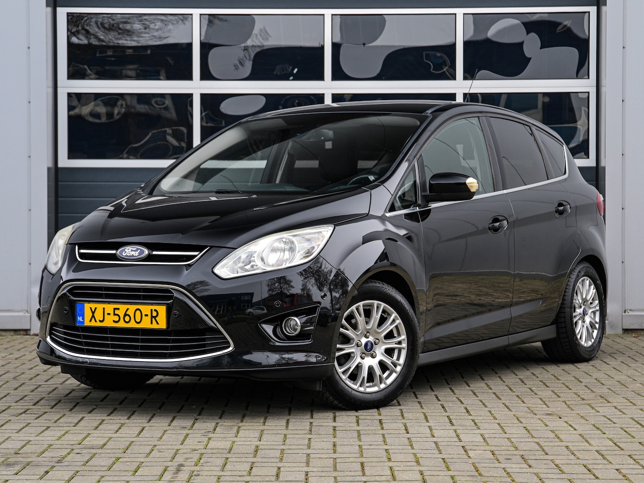 Ford C-Max - 1.6 Titanium | Climate control | PDC v+a | Cruise control | Trekhaak - AutoWereld.nl