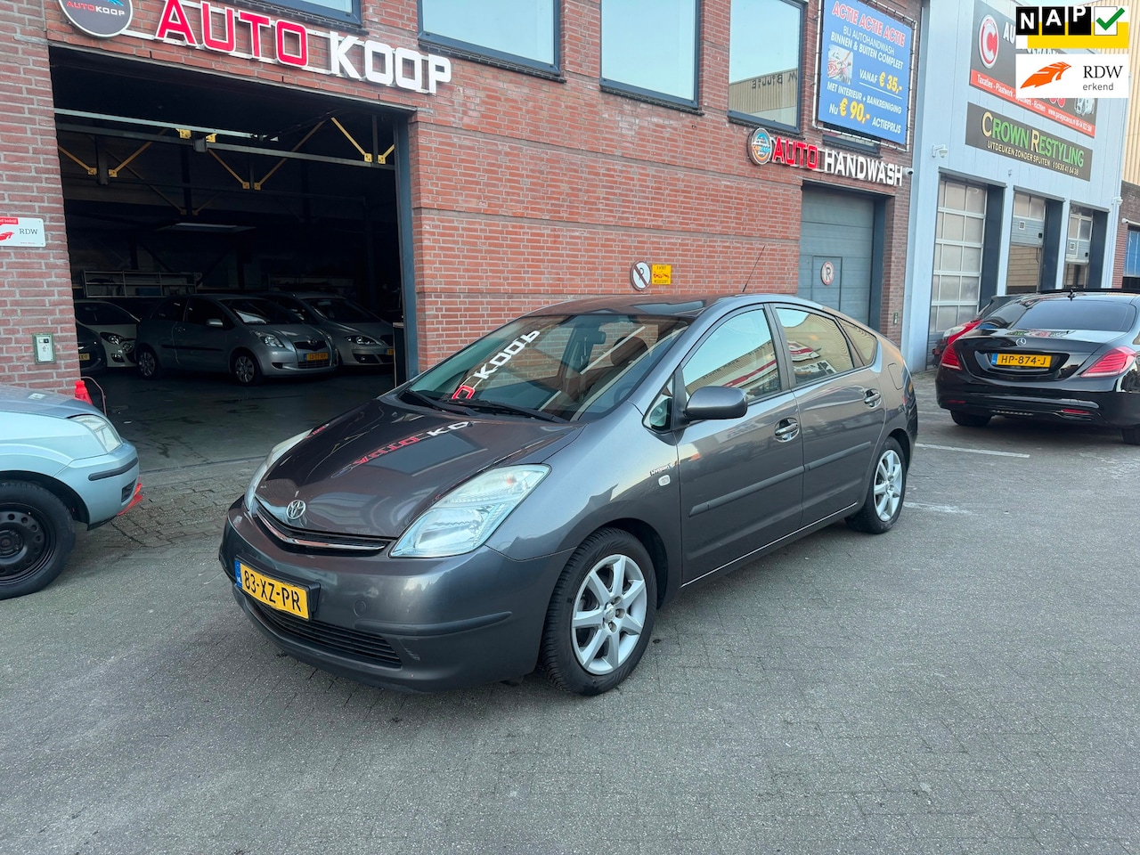 Toyota Prius - 1.5 VVT-i Comfort Hybrid AUTOMAAT Lage Km NAP - AutoWereld.nl