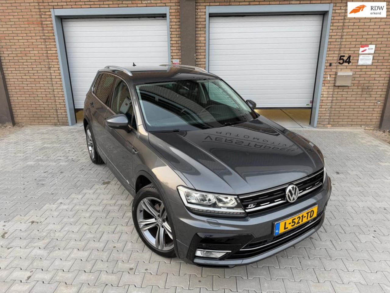 Volkswagen Tiguan - R-line 1.4 TSI 4Motion Highline - AutoWereld.nl