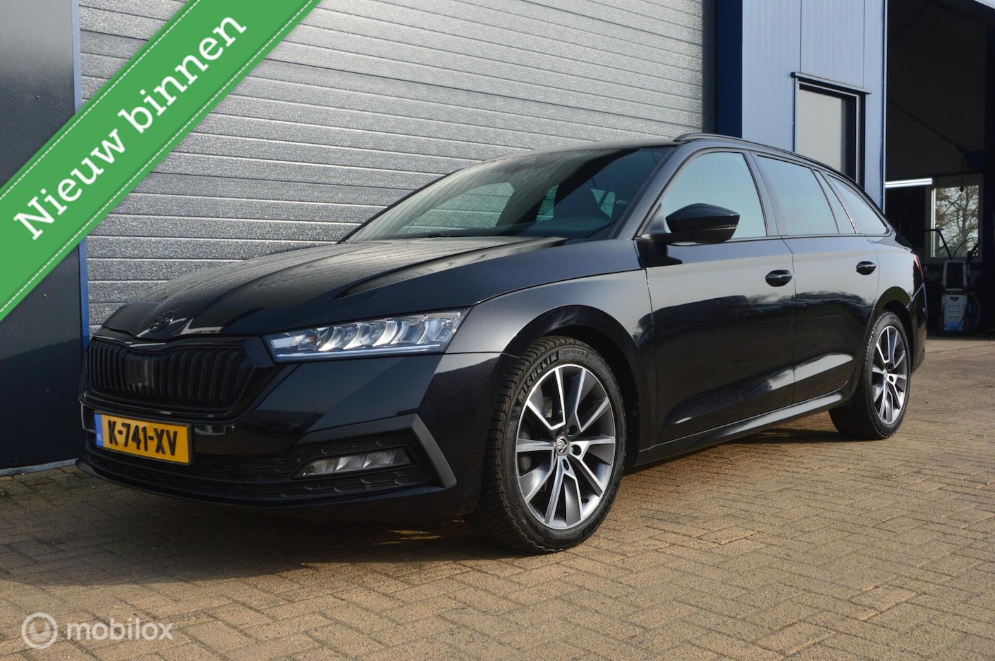 Skoda Octavia Combi - 1.0 e-TSI Sport Business 1.0 e-TSI Sport Business,Trekhaak,Led - AutoWereld.nl