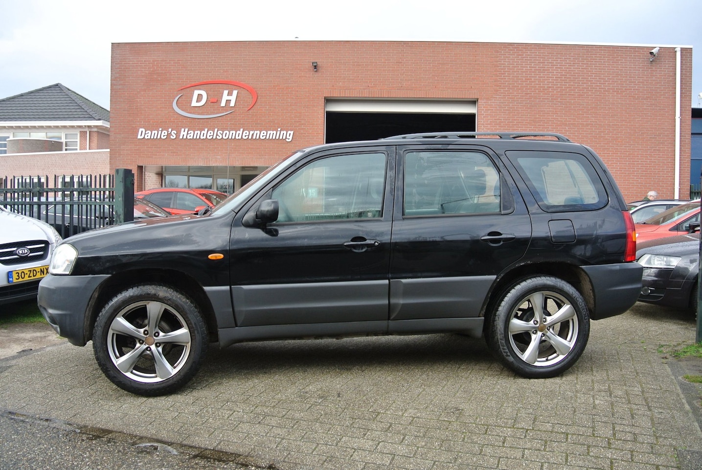 Mazda Tribute - 2.0 Exclusive 4WD AIRCO APK 09-12-2026 INRUIL MOGELIJK NAP - AutoWereld.nl