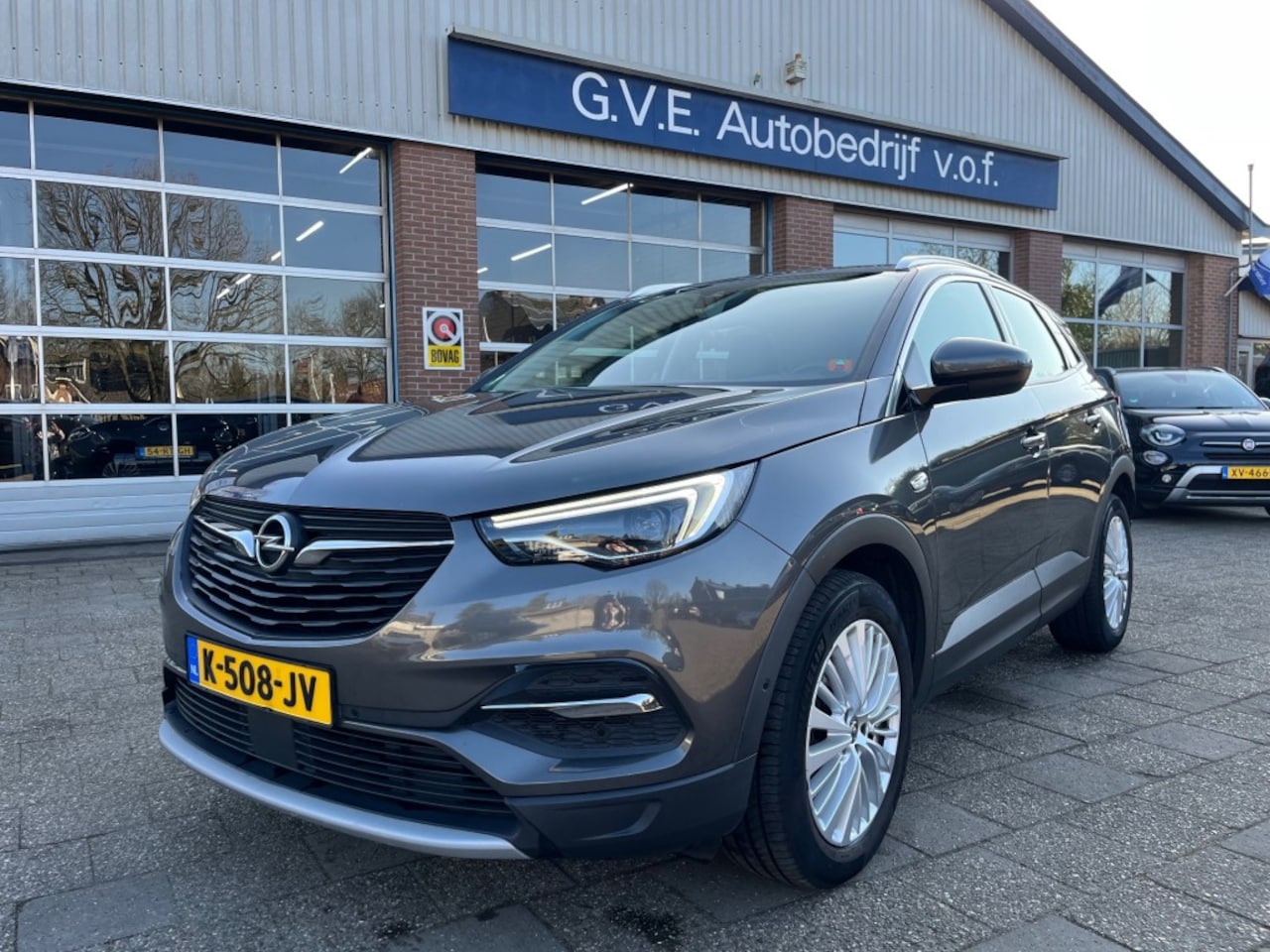 Opel Grandland X - 1.2 TURBO BUS.AUTOMAAT,NAV,DAB,CARPLAY - AutoWereld.nl