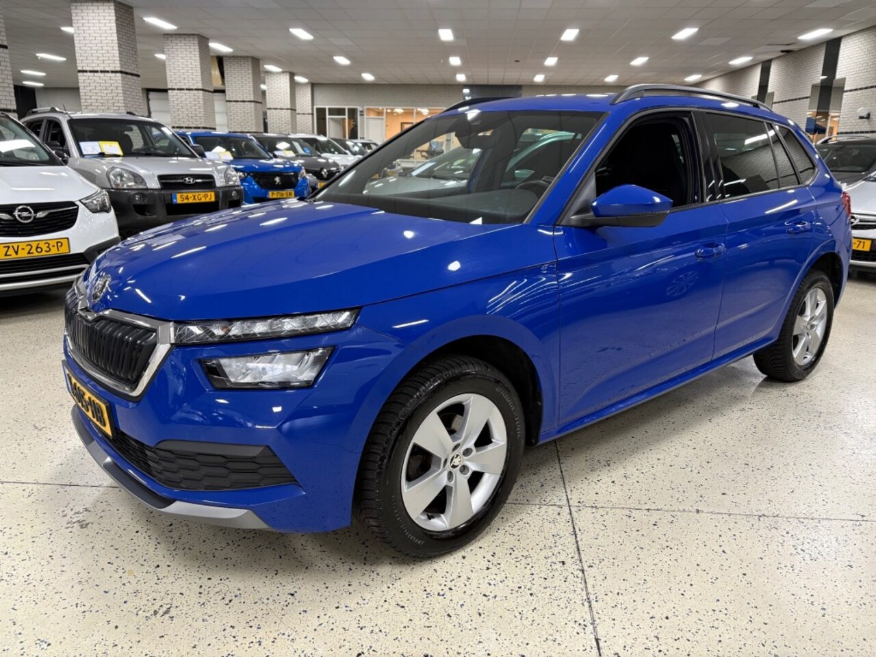 Skoda Kamiq - 1.0 TSI SPORT Automaat  Apple Android Cruise ECC Multimedia - AutoWereld.nl