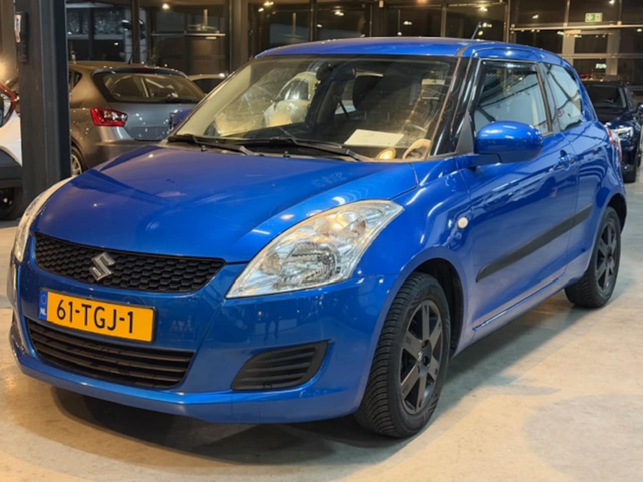 Suzuki Swift - 1.2 94pk 3D Comfort EASS Airco/Lm - AutoWereld.nl